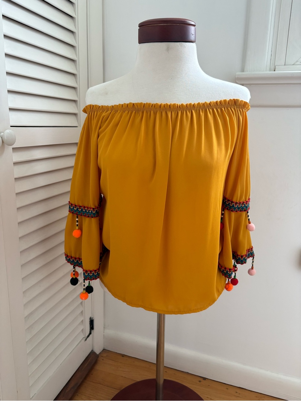 Off-Shoulder Mustard Pom-Pom Sleeve Top